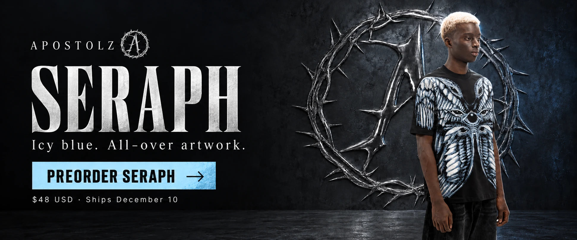 Seraph: icy blue all-over artwork tee on a model. Preorder Seraph, $48 USD, ships December 10.